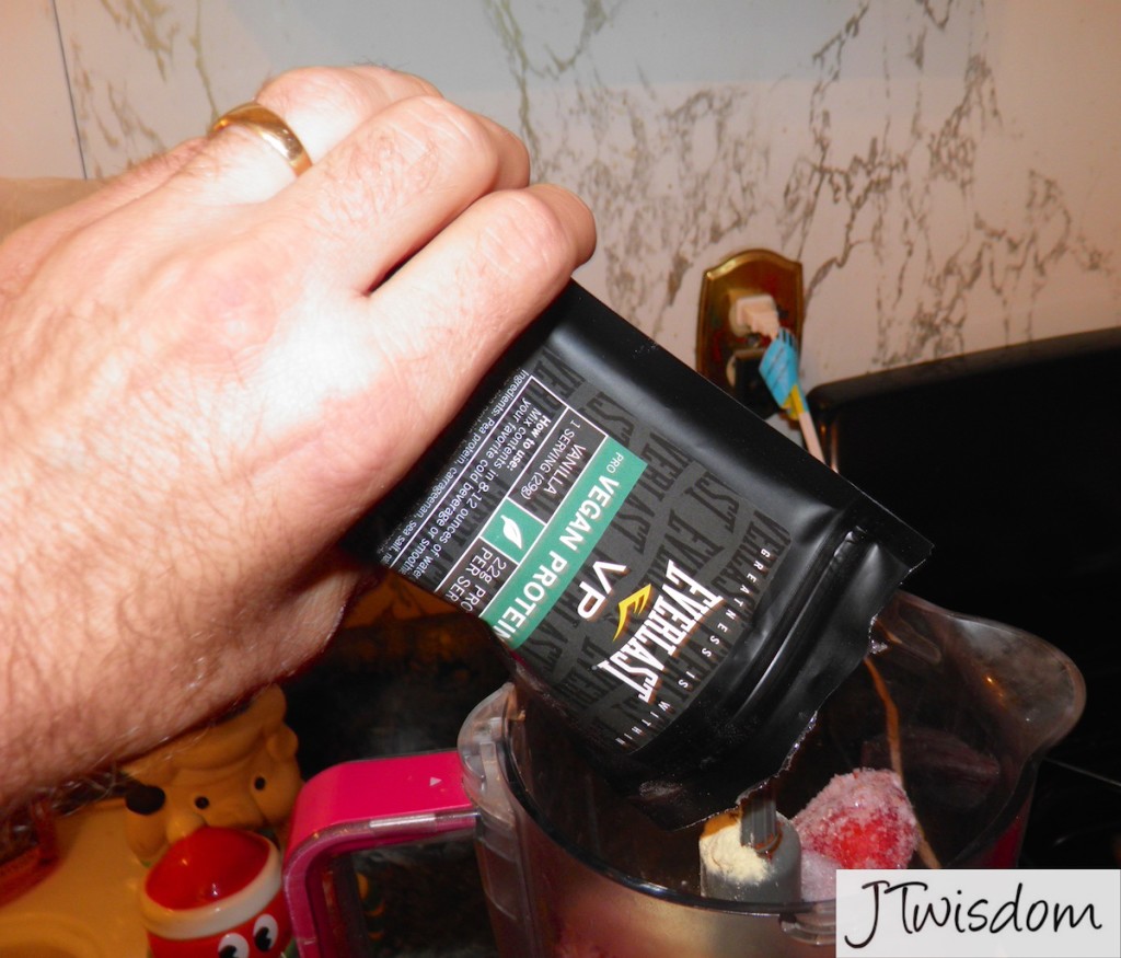 My hubby making a smoothie with Everlast VP Vegan Protein Mix